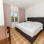 Zora By Belmont Realty *
