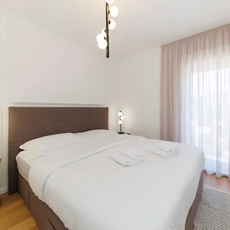 Zora By Belmont Realty *