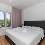 Zora By Belmont Realty *
