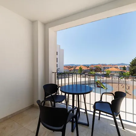 Zora By Belmont Realty *