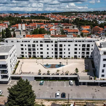 Zora By Belmont Realty *